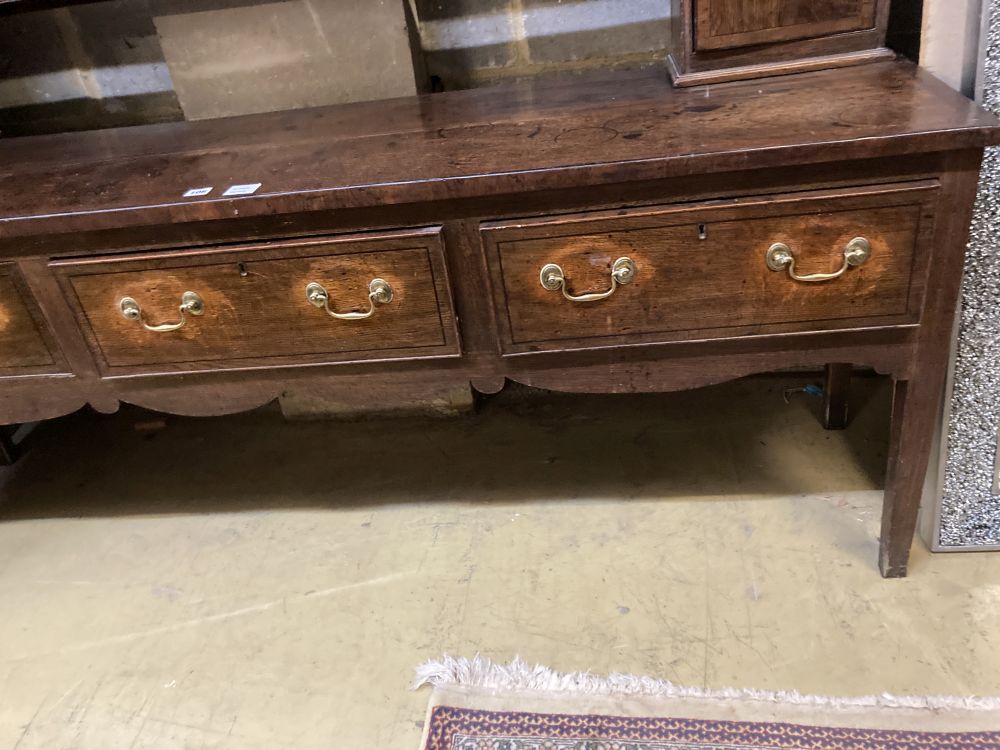 A George III oak dresser, width 186cm depth 46cm height 198cm